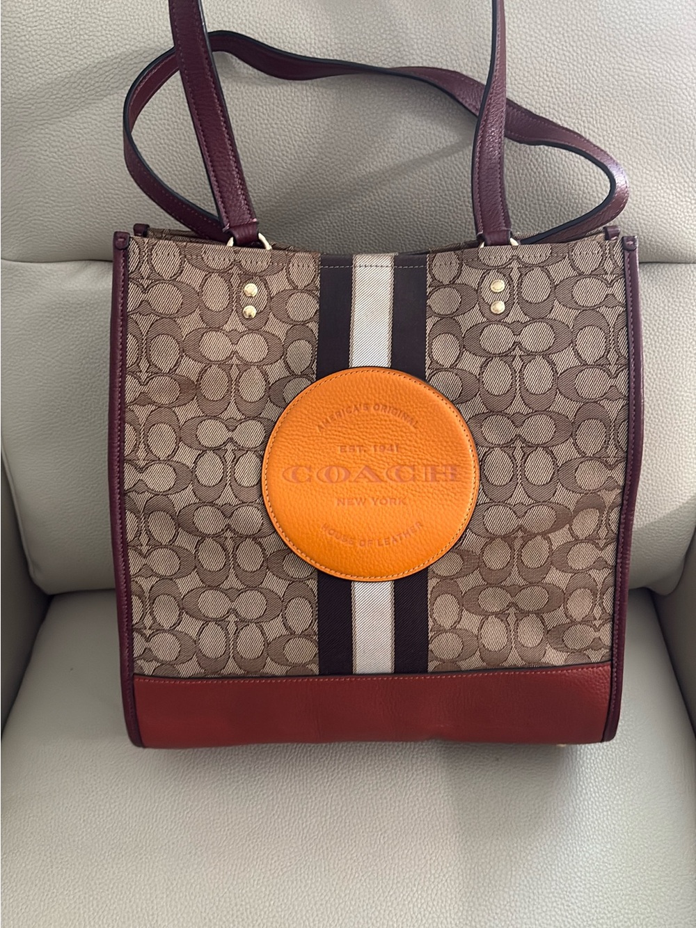 Coach Beige Signature Canvas Shoulder Bag with Orange Patch and Burgundy Trim